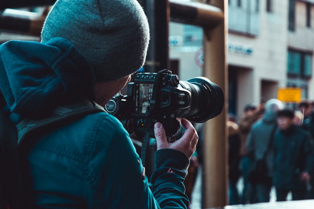 Photographer working with a portrait subject